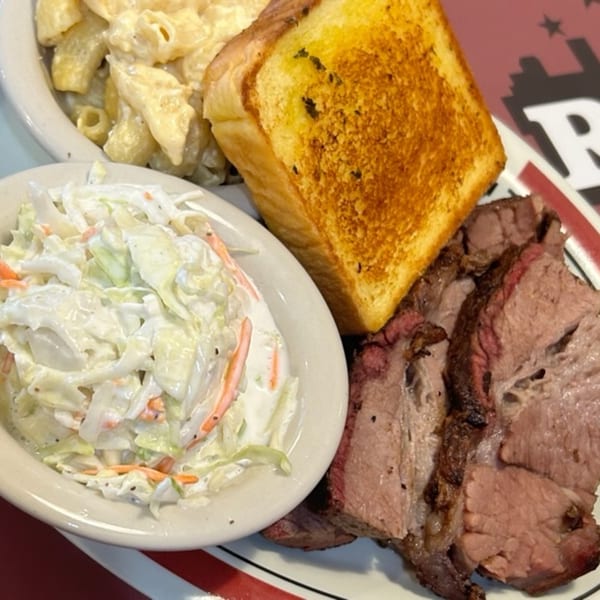 Rib City's sliced beef brisket with coleslaw, macaroni and cheese, and Texas toast.